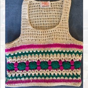Charlie’s Girls Inc. vintage patchwork pullover vest.